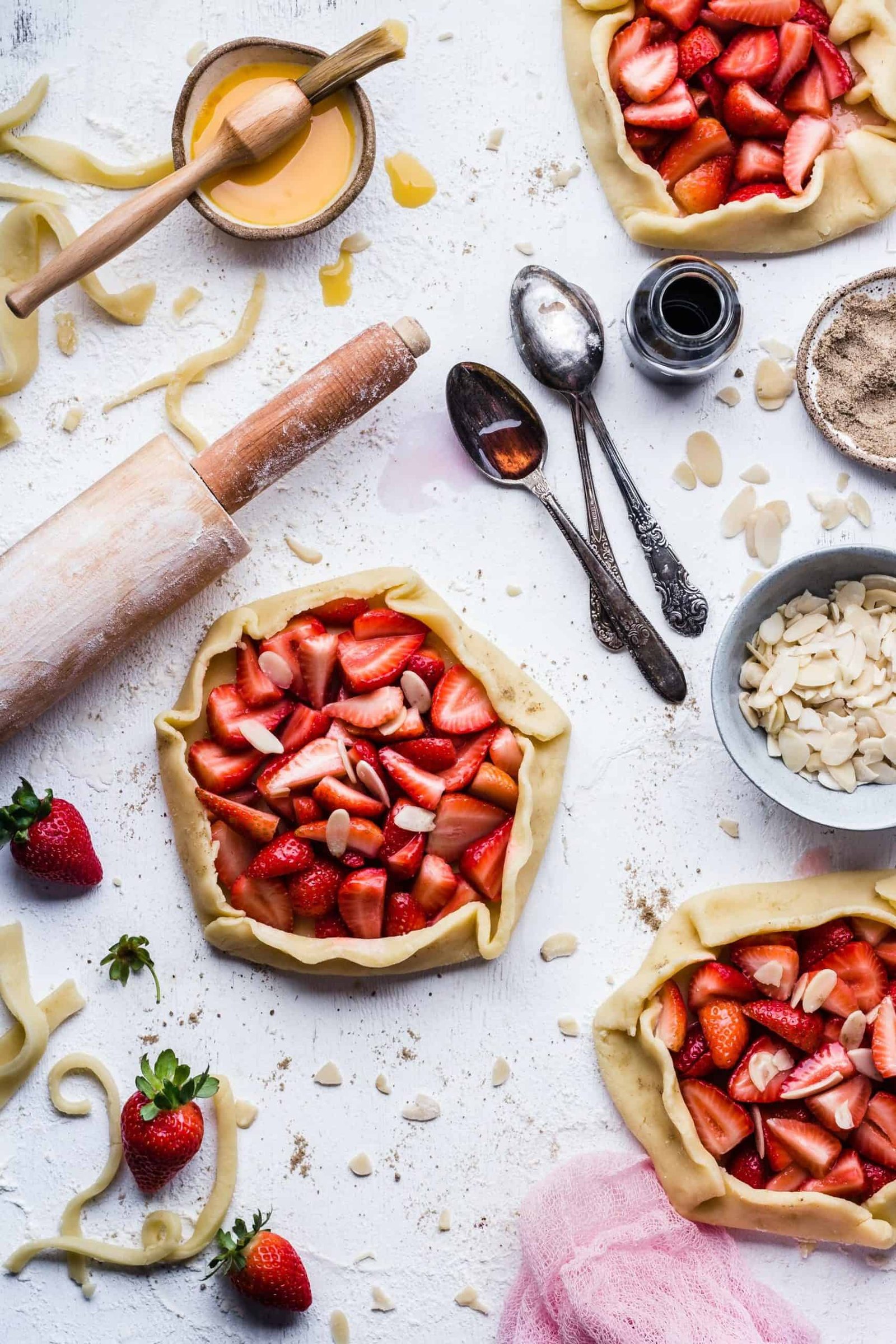 essential baking tools for beginners laid out on a kitchen counter